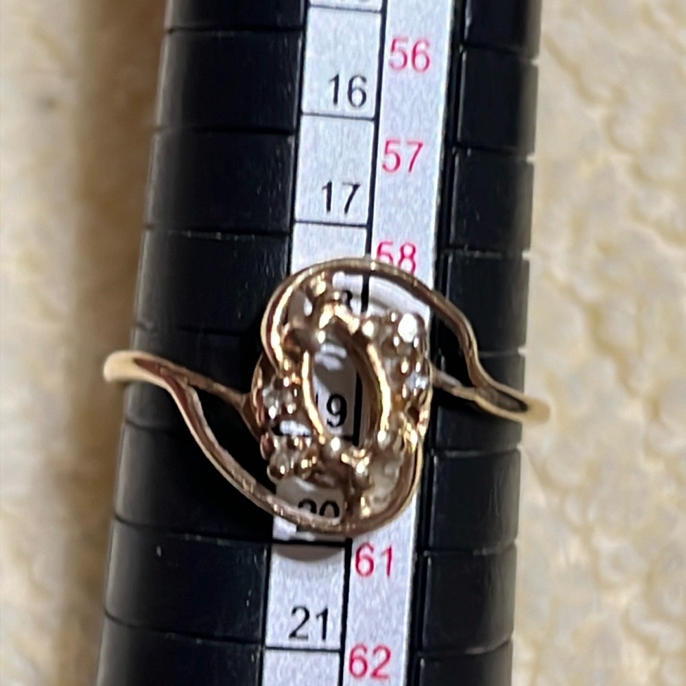 14k and diamond ring setting.